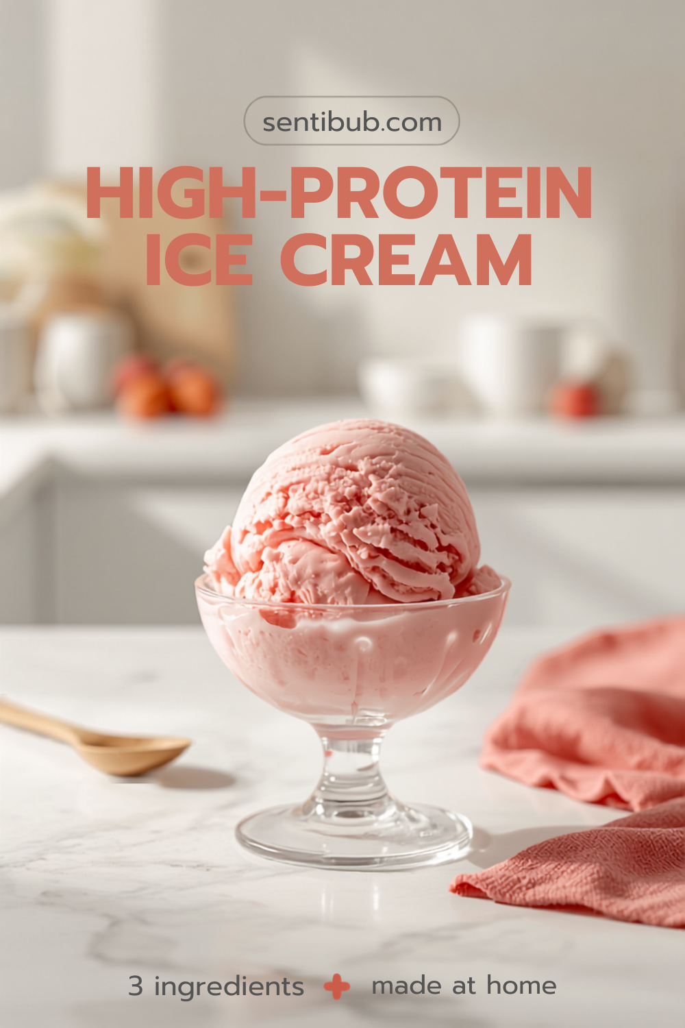 scoops of pink strawberry high-protein ice cream made in a Ninja CREAMi, styled on a bright kitchen counter