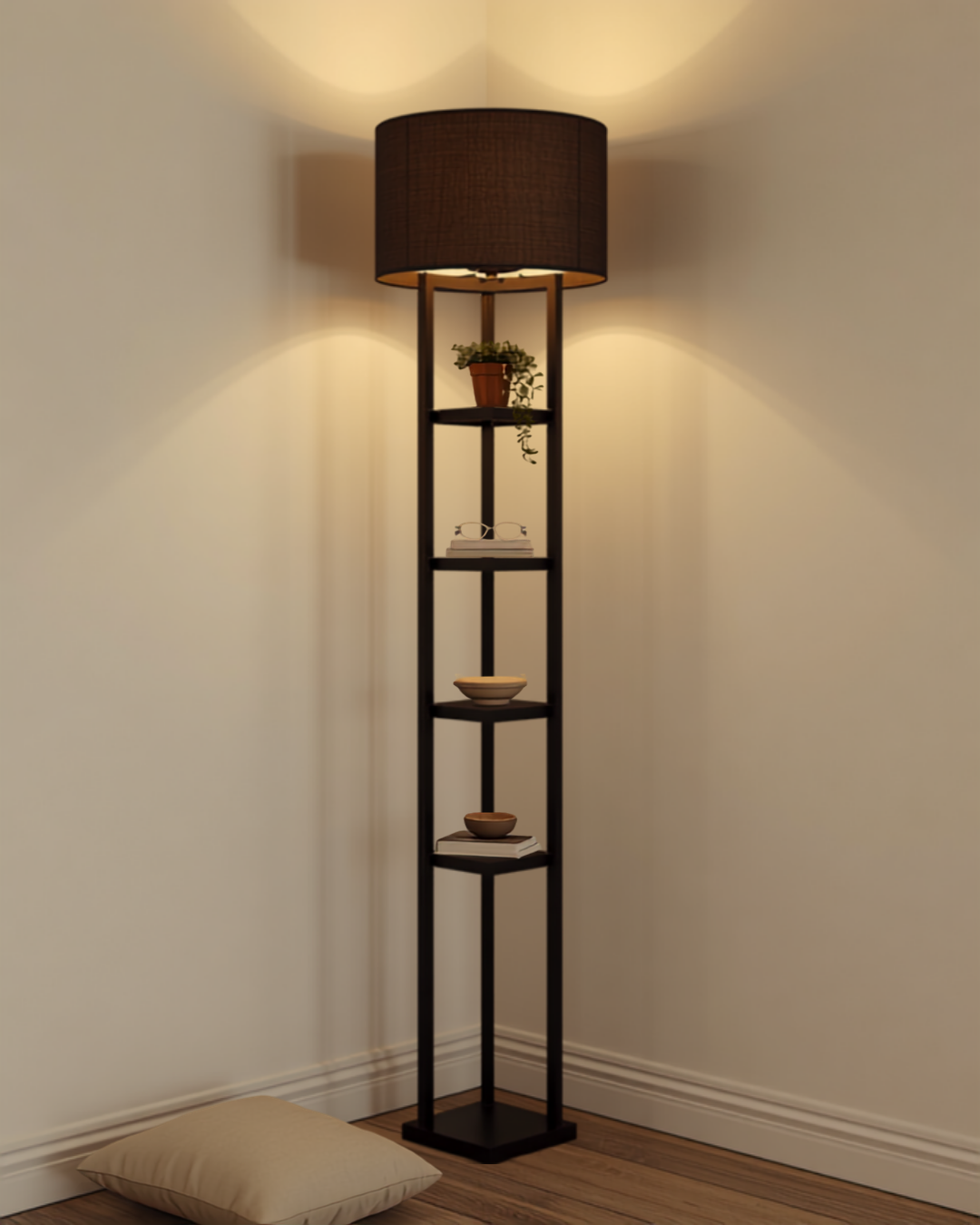 a tall black floor lamp with four square wooden shelves built into the post standing in a room corner, warm light glowing from the top shade, books and a small plant stacked on the tiers